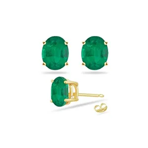 0.69-0.90 Cts of 6x4 mm AA Oval Natural Emerald Stud Earrings in 14K Yellow Gold