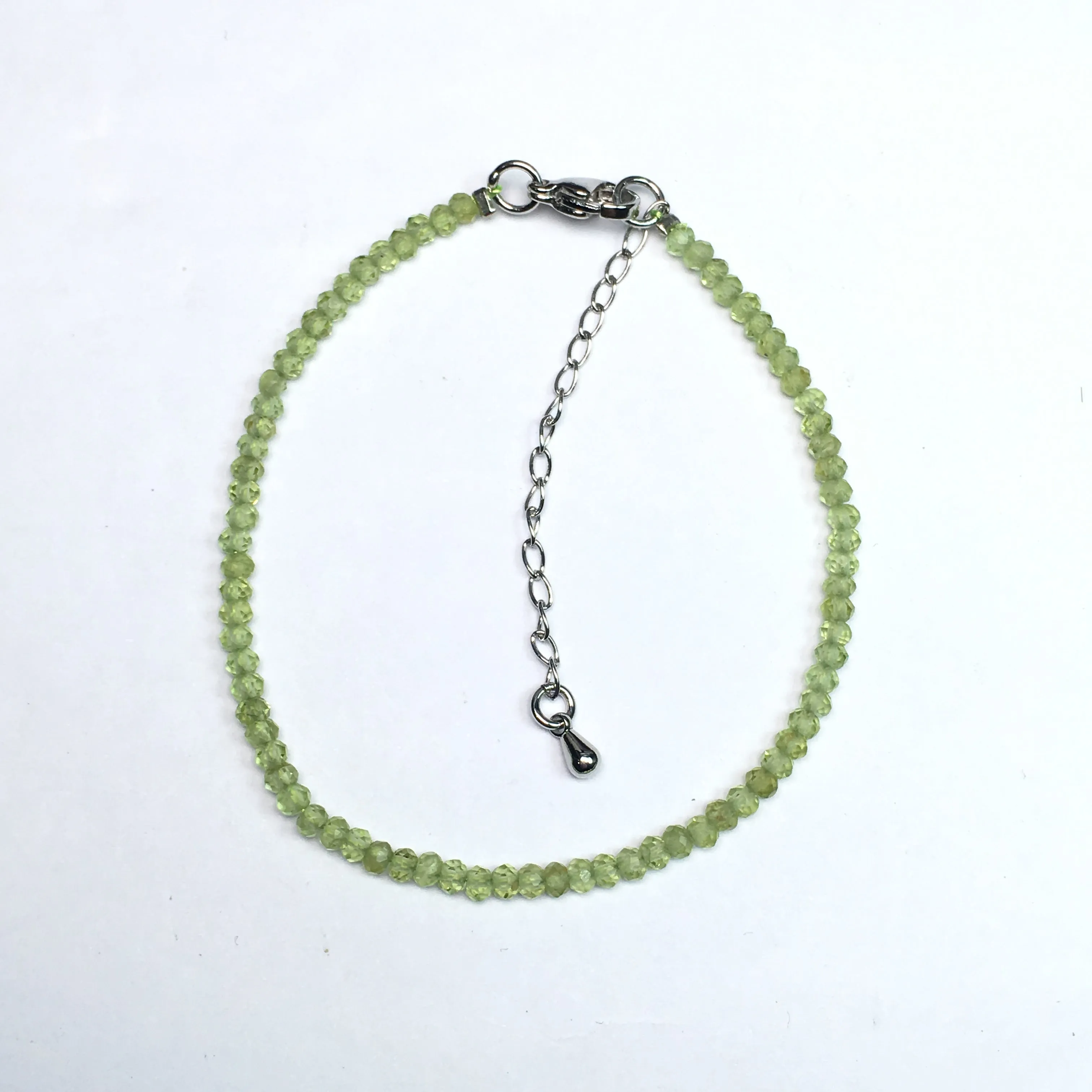 Peridot Super Precision Cut Roundel 2X3mm bracelet